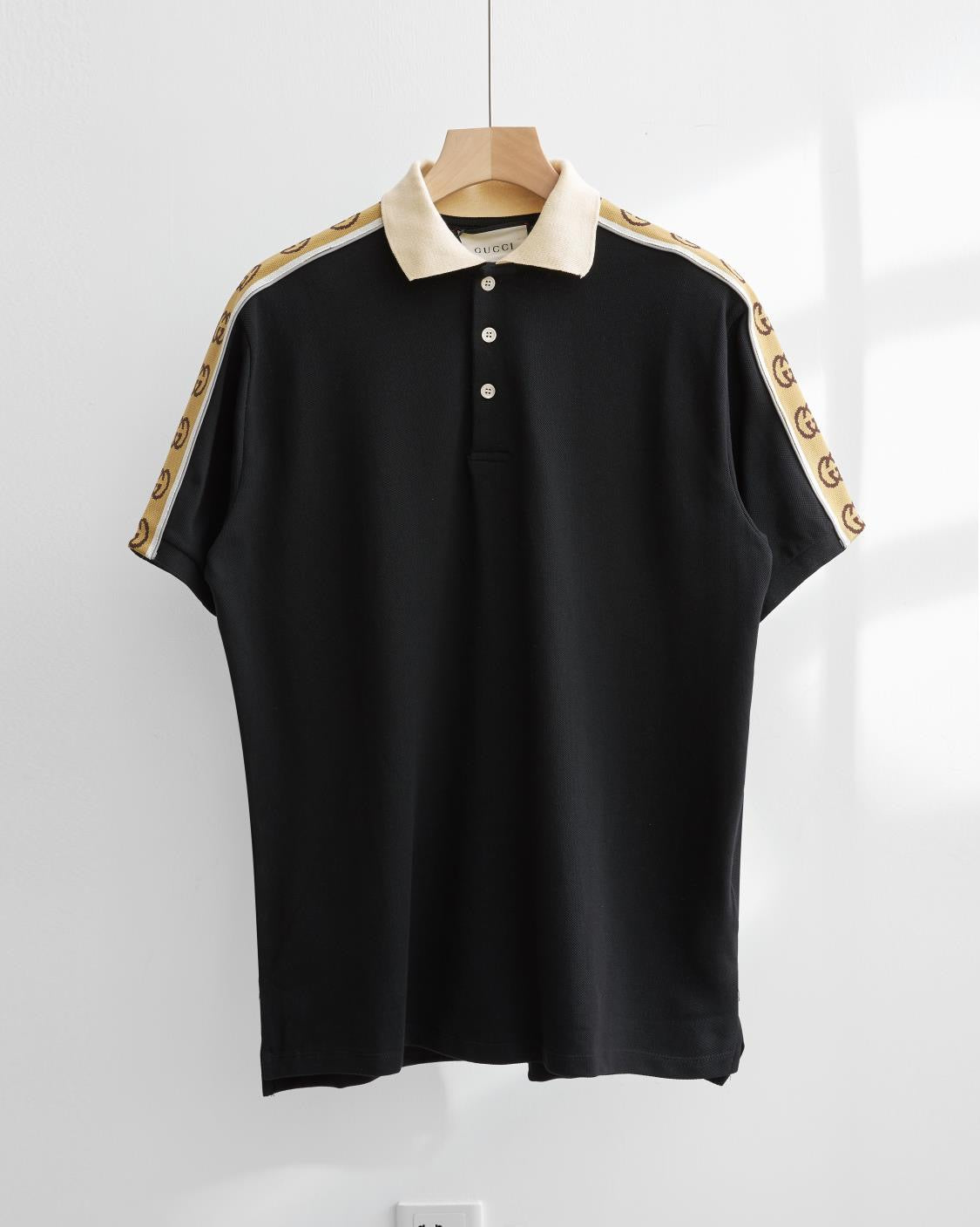 Black polo shirts